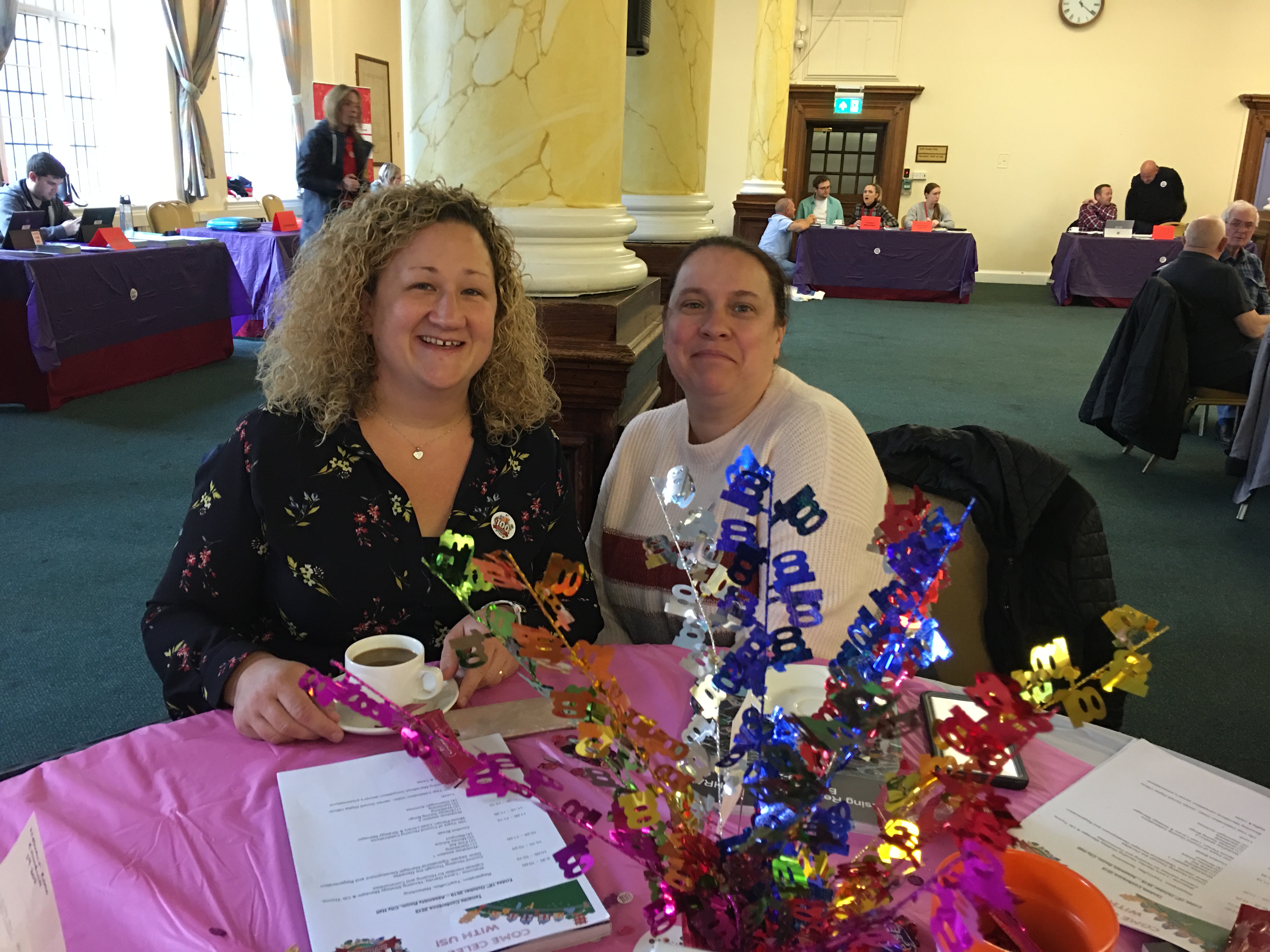 two females cardiff council tenants celebrating at our tenants conference